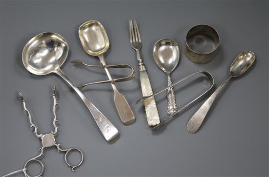 A pair of Georgian silver sugar nips and sundry small silver including sauce ladle, napkin ring, spoons etc.